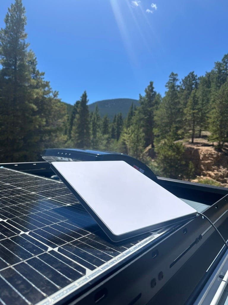 Starlink atop the solar panels.